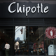Chipotle store signage is seen on August 10, 2022, in New York City. NYC Mayor Eric Adams announced on Tuesday that Chipotle Mexican Grill announced that they would be paying $20 million dollars to current and former workers in their NYC restaurants for violating city labor laws